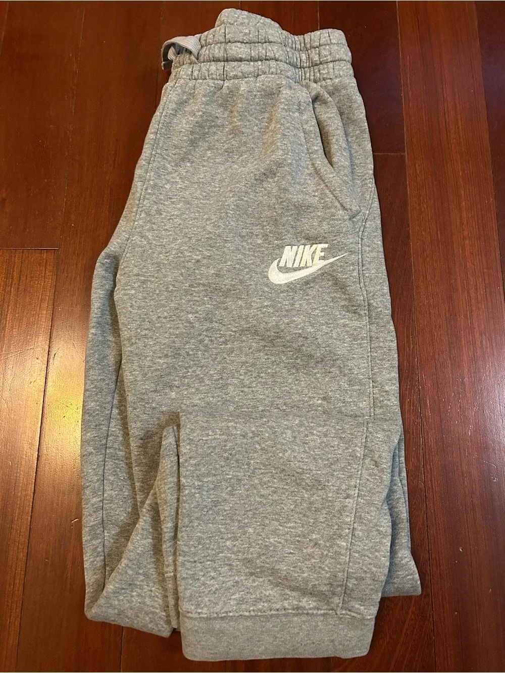 Nike Gray Kids Sweatpants with White Swoosh